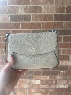 kate spade pebbled leather crossbody in light taupe